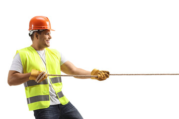 Wall Mural - Construction worker pulling a rope