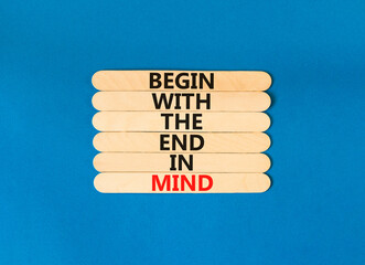 Wall Mural - Begin in end of mind symbol. Concept words Begin with the end in mind on wooden stick. Beautiful blue table blue background. Business begin in end of mind concept. Copy space.