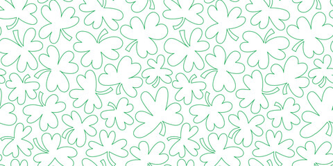 Wall Mural - Green shamrock seamless pattern illustration. Natural clover leaf plant background print. St. Patrick's day holiday backdrop texture, irish culture wallpaper design.	