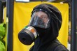 Tête de mannequin portant une combinaison NBC avec masque à gaz intégré, appareil respiratoire filtrant de protection anti-gaz contre le risque nucléaire / biologique / chimique