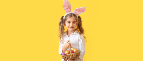 Sticker - Little girl with Easter eggs and bunny ears on yellow background