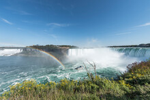 A Tour Boat At The End Of A Rainbow Takes Tourists To The Base Of The Horseshoe Falls In Niagara Falls Ontario Canada.