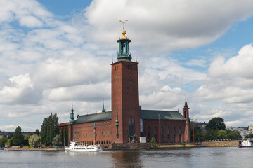 Wall Mural - STOCKHOLM, SWEDEN - AUGUST 24, 2022: Scenic view with the City Hall on a beautiful sunny day, Stockholm, Sweden