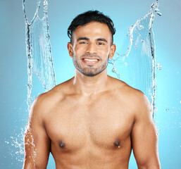 Sticker - Water, splash and portrait of man for beauty, skin and skincare cleaning his body, muscle and topless. Mexican, male model with moisture, cleanse and hydration isolated in studio blue background