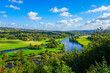 View of the Ruhr and the surrounding green landscape from the Ruhr slope. Nature on the river near Hattingen in the Ruhr area.
