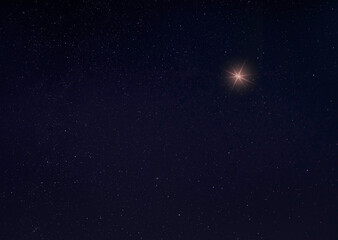 Wall Mural - Single bright star on a starry night