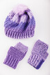 © Ahmed - purple ice cap and gloves in white background