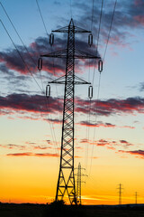 Wall Mural - Detail of electric pole with electric cables at sunset