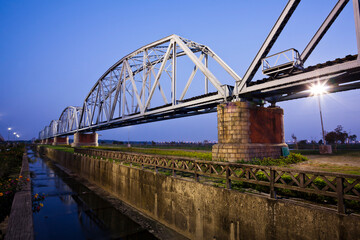 Wall Mural - Building view of the Old Railway Bridge Across the Gaoping River in Kaohsiung, Taiwan. it was built in 1913 by the Japanese colonial government.