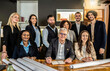 © Davide Zanin - Multiethnic joyful business people looking at camera inside corporate office for a group photo while working together on sustainable innovation project - Goal achievement concept