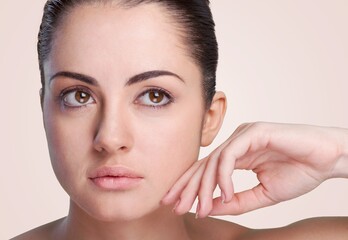 Canvas Print - Happy young woman after facial treatment.