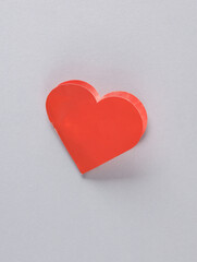 Wall Mural - Red paper heart shaped valentine on gray background