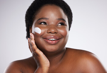 Wall Mural - Cream, face and beauty black woman isolated on a white background for skincare, product or cosmetics smile. African model or person with facial lotion, collagen .or dermatology sunscreen in studio