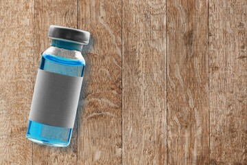 Poster - Glass medical bottle for treatment on the desk