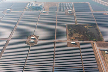 Canvas Print - Solar Photovoltaic of aerial top view, solar plant rows array of ground mount system Installation	
