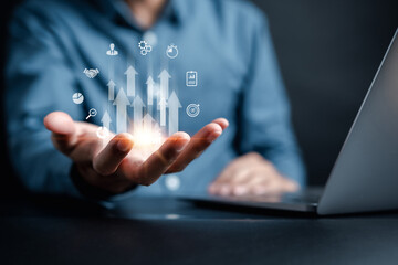 Aufkleber - Businessman holding increase up icon with business objective to set up business objective target goal, marketing solution, target for business investment.