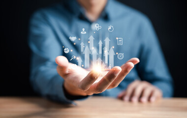 Aufkleber - Businessman holding increase up icon with business objective to set up business objective target goal, marketing solution, target for business investment.