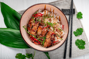 Canvas Print - Roast pork with teriyaki sauce sprinkled with white sesame seeds. Asian cuisine.