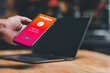 © Mdisk - A man's hand holds a smartphone on screen with message Payment Successful in a supermarket. Concept of financial transactions with mobile devices. Closeup, money, transfer, online. blurred background