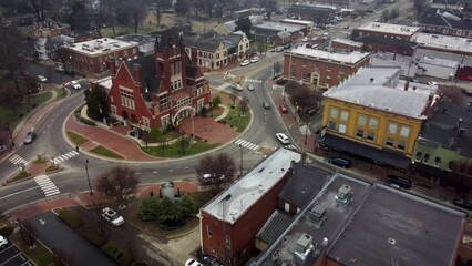 Wall Mural - Drone approaching old nelson county courthouse in Bardstown, Kentucky with traffic on the roundabout around it