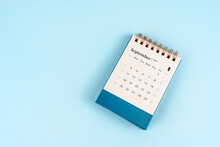 September 2023 Desk Calendar On Blue Background