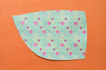 Canvas Print - cut scrapbook paper shape with florals and swirls on orange