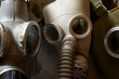 © Cavan - Old respiratory masks from the Cold War era, hanging in a wall.