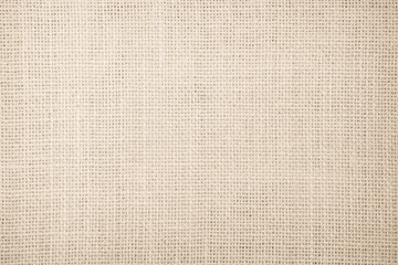 Wall Mural - Jute hessian sackcloth burlap canvas woven texture background pattern in light beige cream brown color. Natural weaving fiber linen and cotton cloth texture.