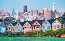 Painted Ladies Victorian Houses In Alamo Square And A View Of The San Francisco Skyline And Skyscrapers. Photo Processed In Pastel Colors