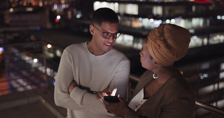Poster - Night, man and black woman with smartphone, connection and social media outdoor. Latino male, Nigerian female and cellphone for communication, share ideas and discussion late evening or online search