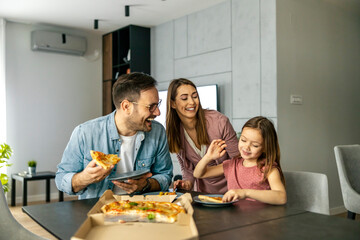 Sticker - Happy family eating pizza  at home