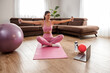 © ivanko80 - Attractive woman exercising at home