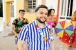 © kleberpicui - Portrait of a Brazilian man during a carnival block