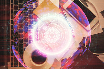 Fototapete - Technology hologram drawing over computer on the desktop background. Top view. Double exposure. Tech concept.