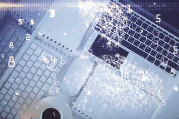 Fototapete - Technology hologram drawing over computer on the desktop background. Top view. Double exposure. Tech concept.