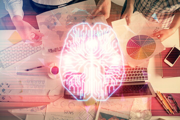 Fototapete - Double exposure of man and woman working together and human brain hologram drawing. Brainstorm concept. Computer background. Top View.