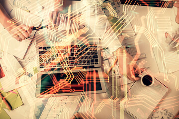 Fototapete - Double exposure of man and woman working together and tech hologram drawing. Technology concept. Computer background.