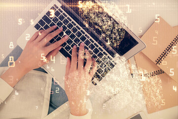 Fototapete - Double exposure of woman hands working on computer and tech theme hologram drawing. Top View. Technology concept.