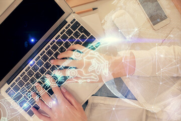 Fototapete - Double exposure of woman hands working on computer and tech theme hologram drawing. Top View. Technology concept.