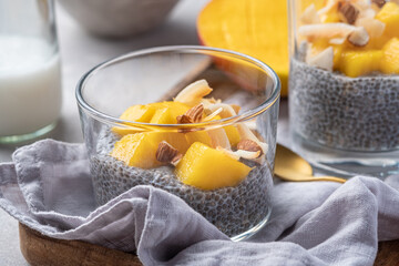 Wall Mural - Coconut milk Chia seed pudding with mango puree and fresh mango