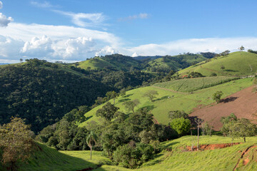 View of the green hills of Serra da Mantiqueira in the state of Minas Gerais, Brazil