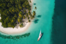 Aerial Drone Footage Taken Above Panama's San Blas Islands Shows A Sailing Yacht Anchored In Clear Water Near To A Pristine White Sand Beach On A Distant Tropical Island Covered In Lush Palm Trees