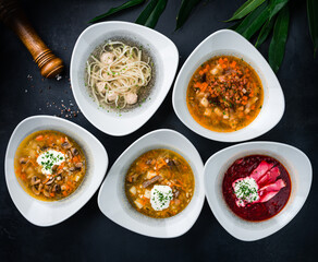 Sticker - Set of soups from the restaurant menu: cucumber soup, mushroom soup, beetroot soup (borscht), soup with noodles and pork meatballs.