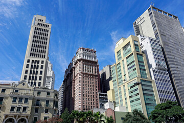 Wall Mural - View of the buildings in Anhangabaú Valley with a blue sky in the background. Downtown of São Paulo city, Brazil