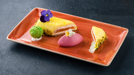 Wall Mural - Piece of lime cheesecake with jelly and macaroons.