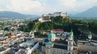 aerial drone panorama of Salzburg city in Austria. View of the historic city of Salzburg and Salzach river at summer.