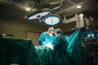 © karrastock - Team of Surgeons Operating in the Hospital. Healthcare concept