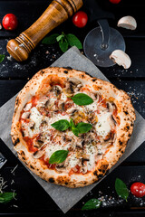 Wall Mural - Pizza with cheese parmesan, champignon mushrooms, tomato sauce, spinach on a thick dough with spices from oven.