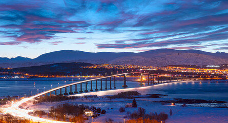 Canvas Print - Urban landscape of Tromso in Northern Norway with full moon - Arctic city of Tromso with Sandnessundet bridge -Tromso, Norway 