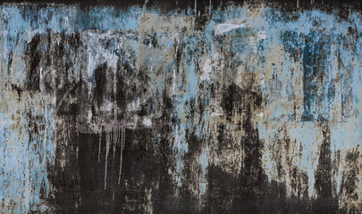 Wall Mural - Torn Ripped Aged Paper Poster Street Wall Surface. Black and Blue Colors. Leaking Paint. Grunge Rough Dirty Rust Background. Urban Collage Texture.